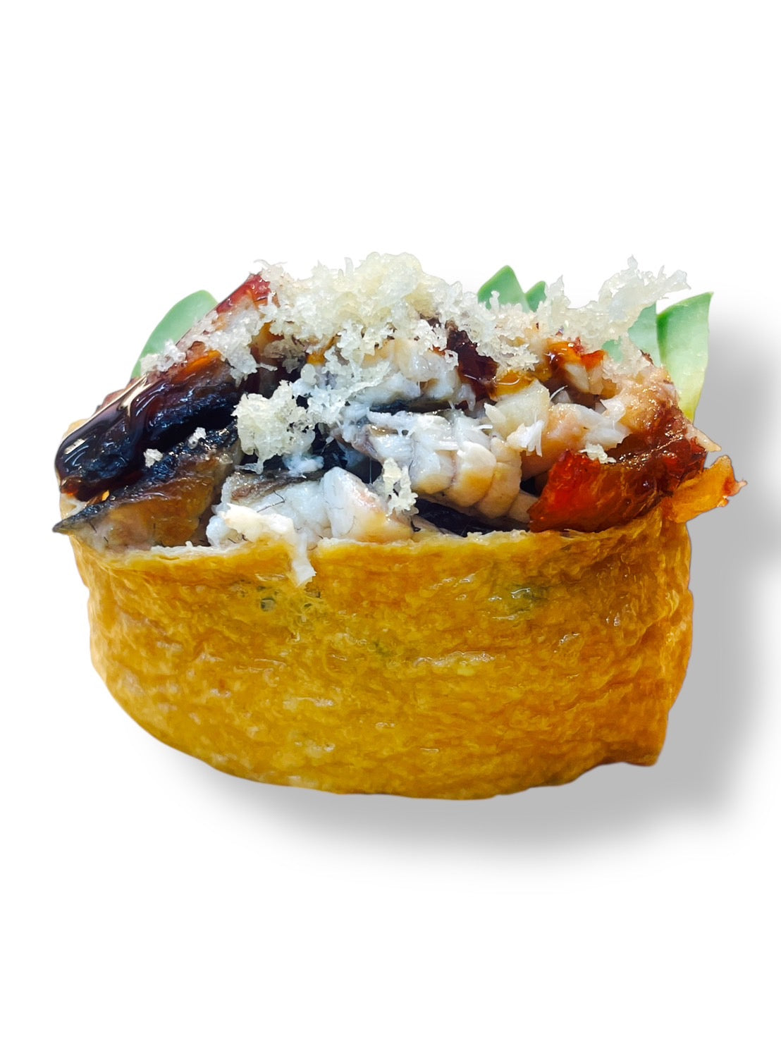 Inari sushi topped with baked eel pieces, mixed with rice and finished with crispy tempura flakes.