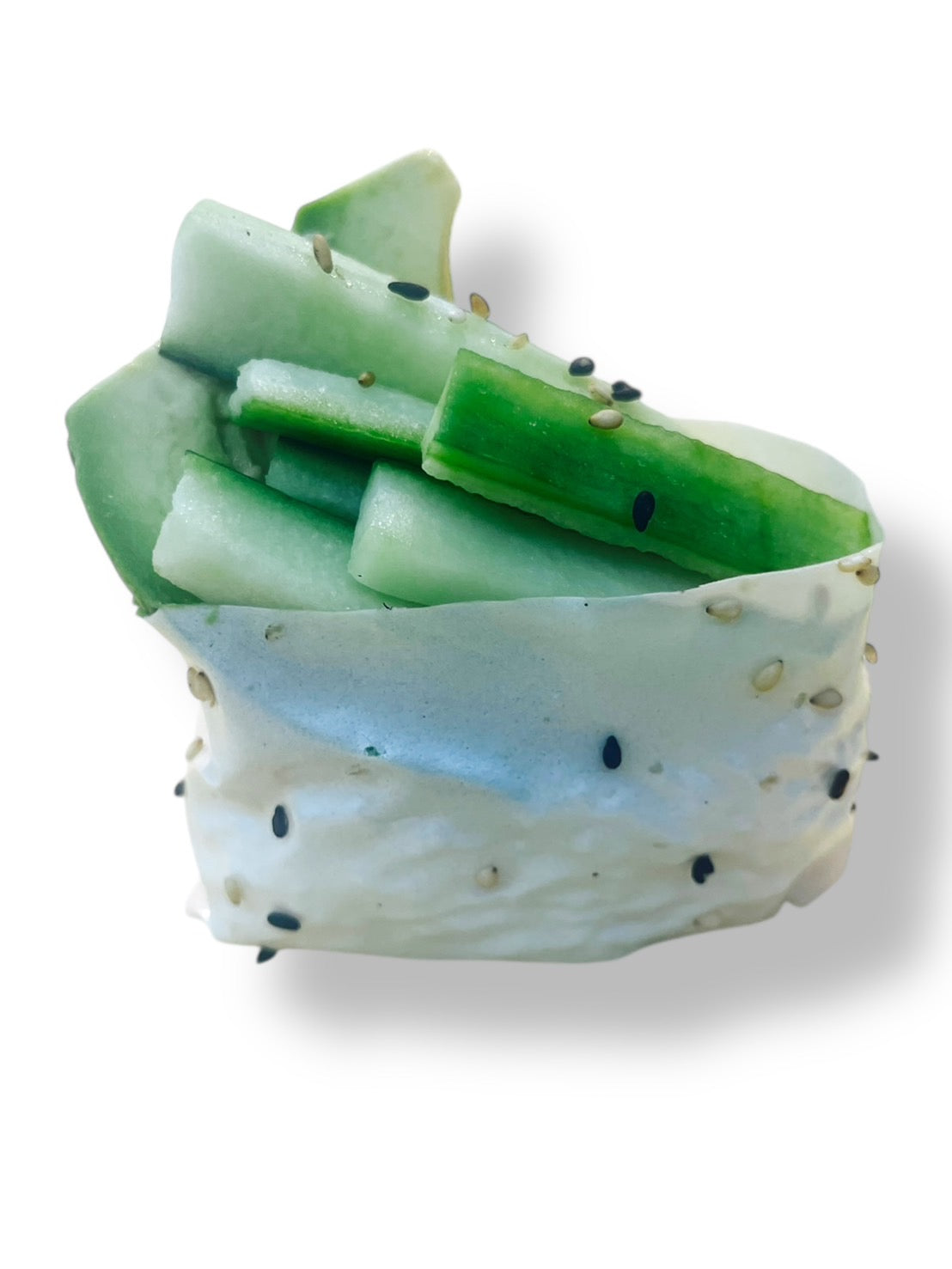 Fresh cucumber sushi wrapped with sesame-studded rice on a white background