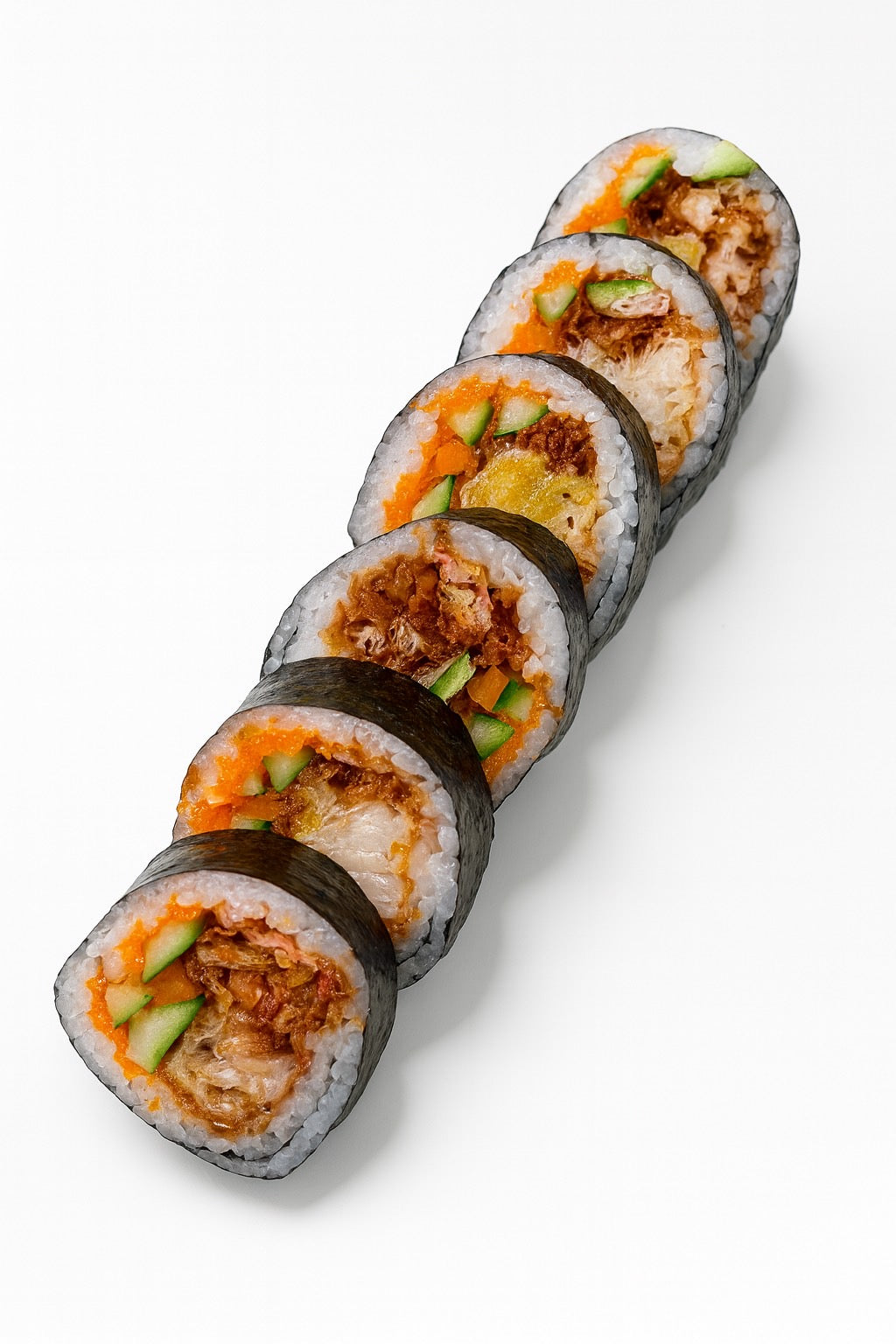 Rolls of sushi with various fillings on a white background