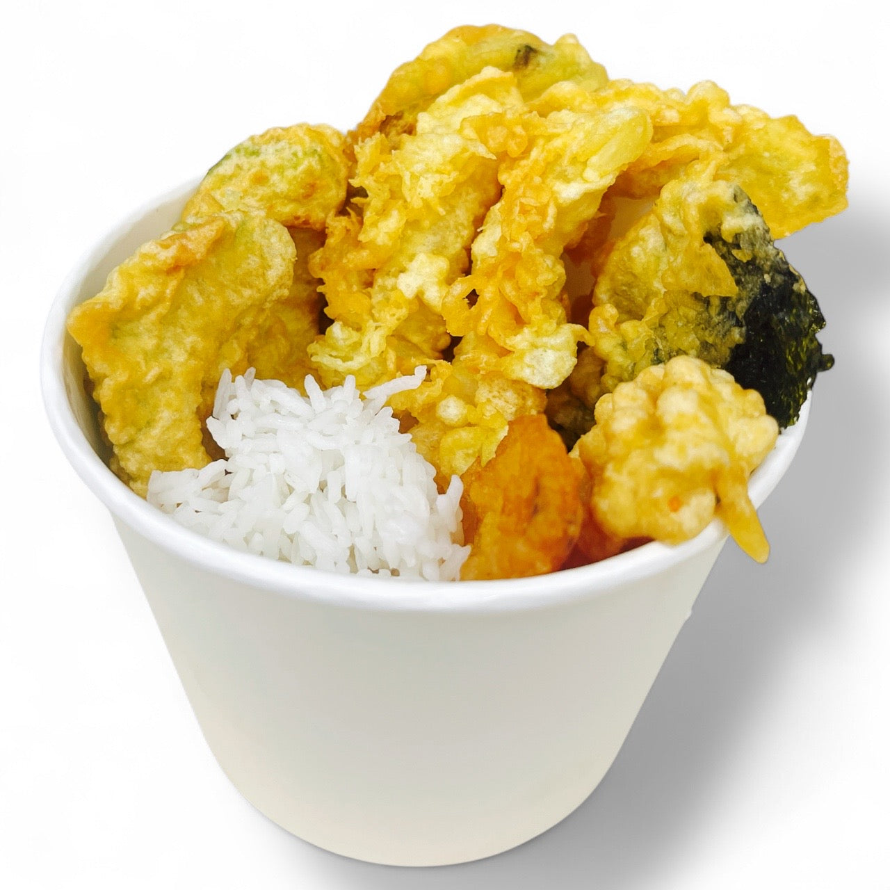 White bowl with fried vegetables and white rice on a white background
