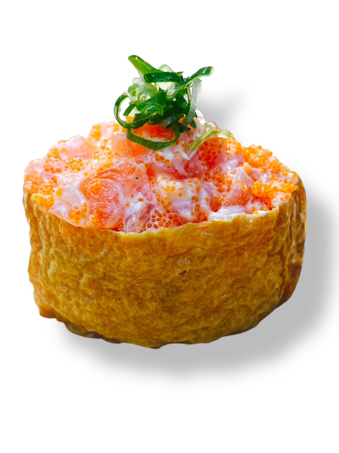 Inari sushi filled with creamy salmon mayo mixed with masago, topped with fresh green scallions.
